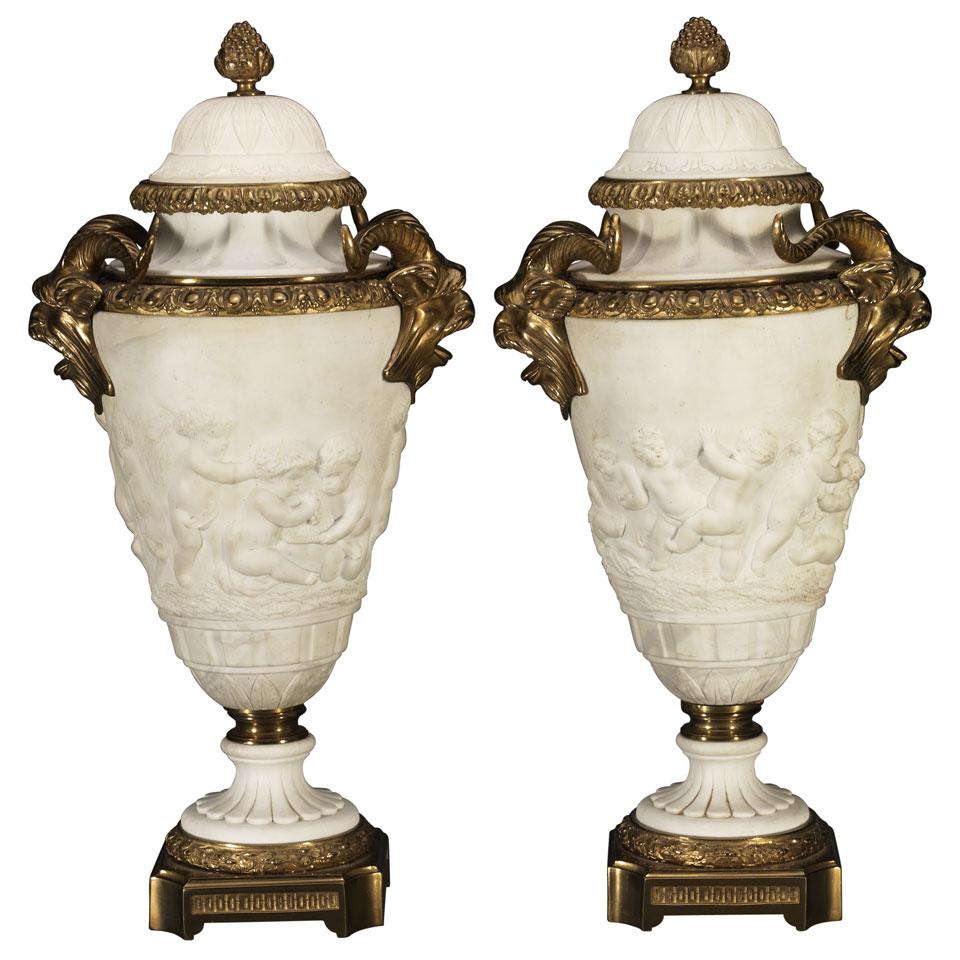 Pair of Gilt Bronze Mounted ‘Sèvres’ Parian Covered Urns, late 19th century