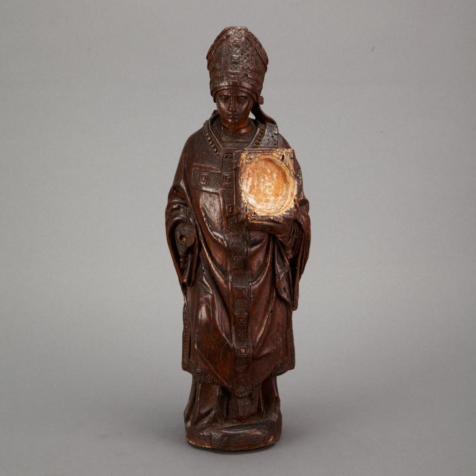 French Carved Walnut Reliquary Figure of a Bishop, early 19th century