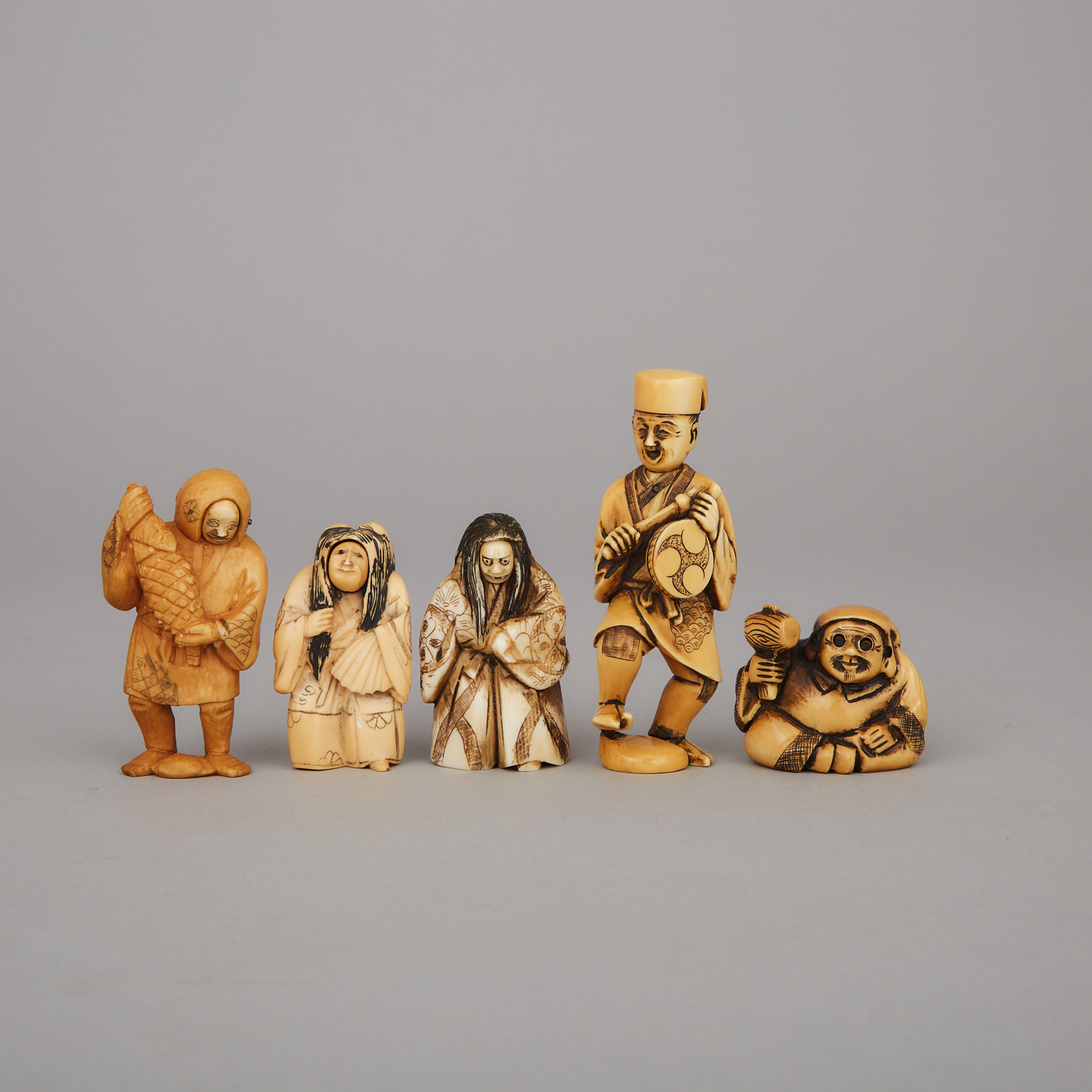 A Group of Five Ivory and Ivorine Trick Netsuke, Meiji Period and Later